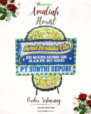 Papan Bunga Duka di Tanah Luas